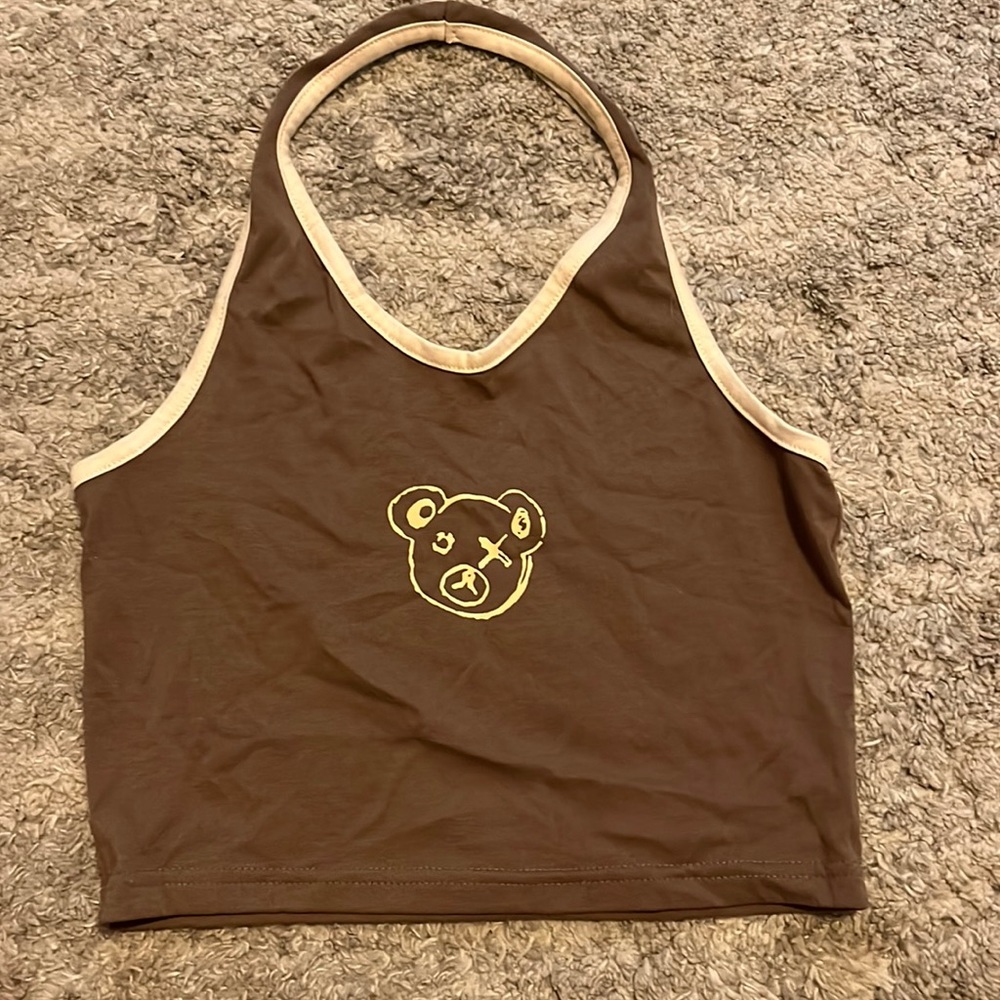 Women’s brown and cream bear cropped backless shirt.